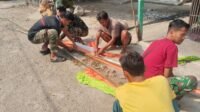 Semangat Baru di Parangjoro Saat Warga dan TMMD Pasang Umbul-umbul Semangat Baru di Parangjoro Saat Warga dan TMMD Pasang Umbul-umbul