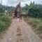 Pengoperasian Excavator di Patukku dalam TMMD Ke-129 Kodim Bone Percepat Perbaikan Jalan