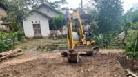 Bagaimana Excavator Mempercepat Pekerjaan Jalan TMMD ke-129 di Pattuku Bagaimana Excavator Mempercepat Pekerjaan Jalan TMMD ke-129 di Pattuku