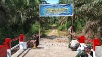 Langkah Akhir Jembatan Garuda: Kodim 0118 Fokus Pengecatan untuk Dukungan Ekonomi