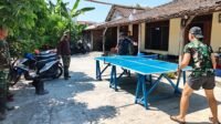 Satgas TMMD Parangjoro Pakai Tenis Meja untuk Menjaga Stamina Saat Istirahat