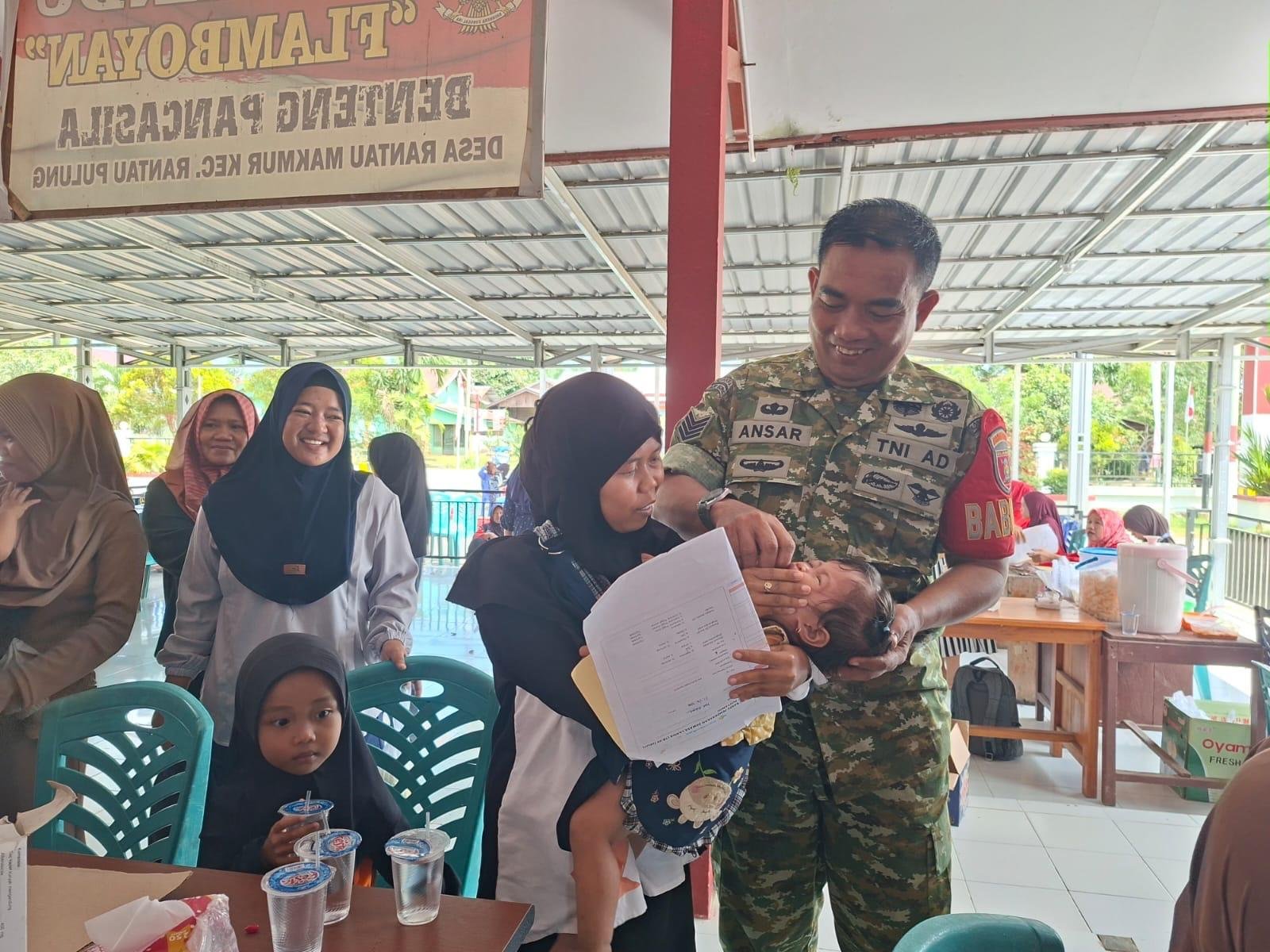 Dukungan Babinsa di Posyandu Rantau Makmur: Fokus pada Balita dan Lansia