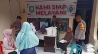 TNI Kawal Penyaluran Bantuan Beras di Jurong Putro Haloeh TNI Kawal Penyaluran Bantuan Beras di Jurong Putro Haloeh