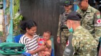 Prajurit YTP 859/RBK Datang Membawa Kesehatan Dan Senyuman Melalui Program SEHATI di Kampung Masram